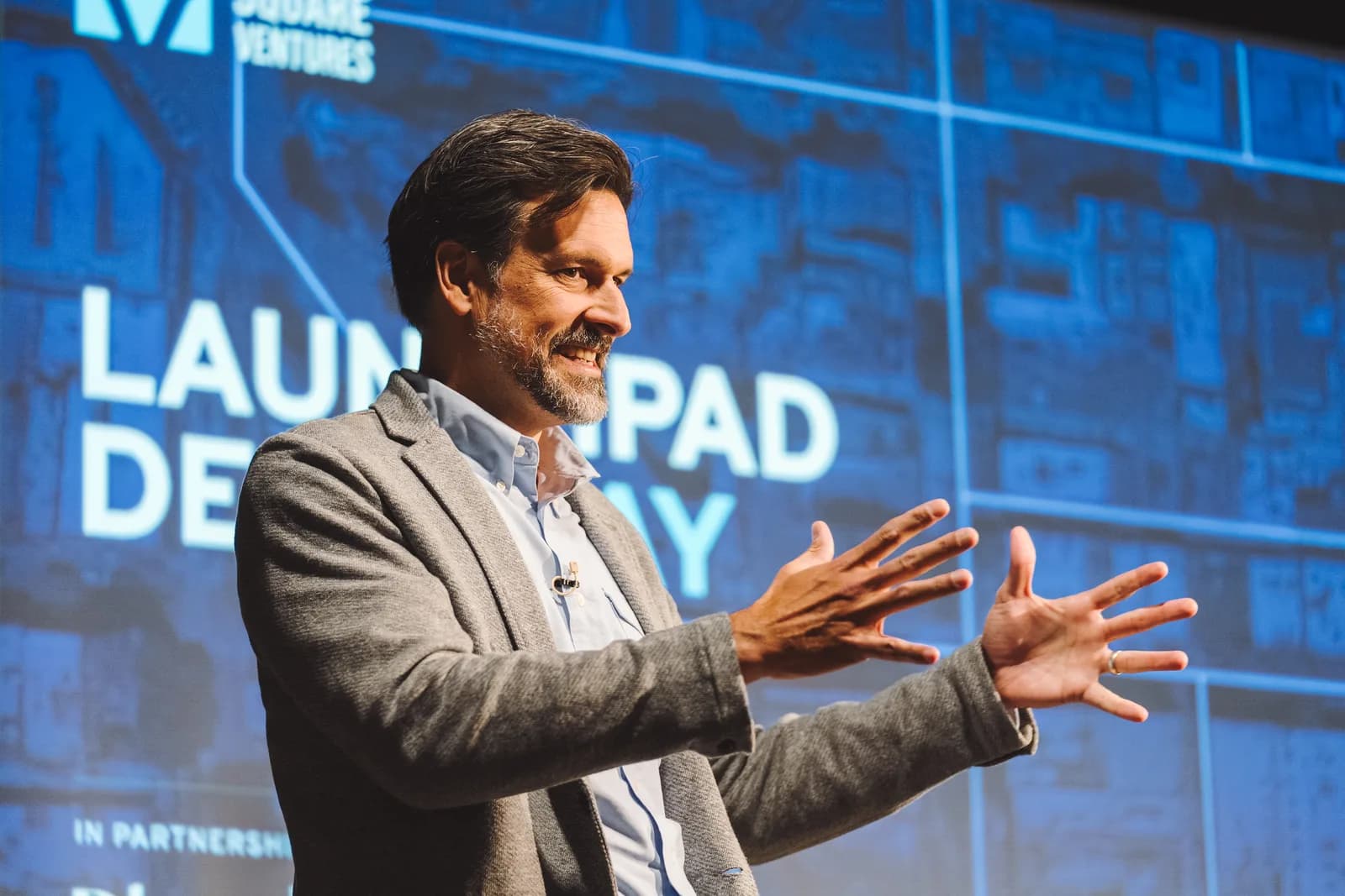 A JSV team member speaking on the Launchpad stage