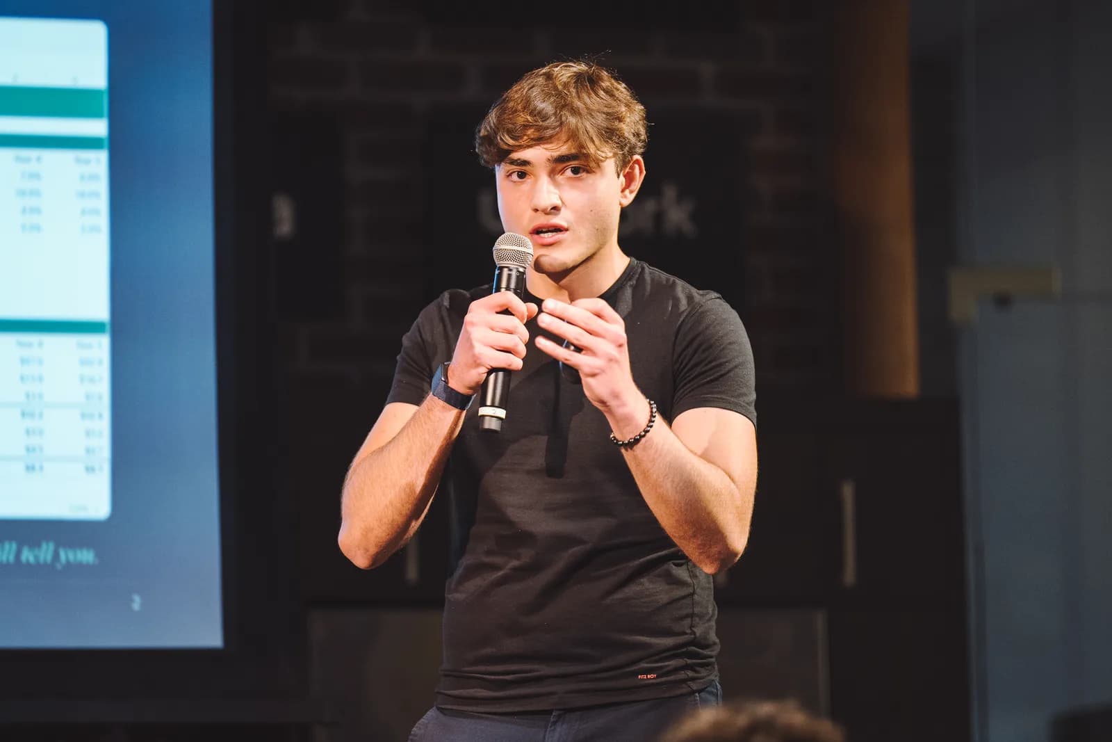 A founder explaining their product on stage