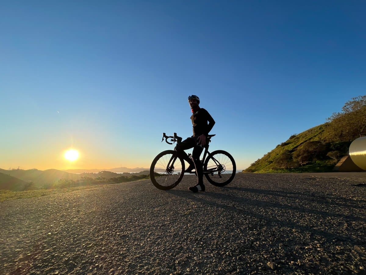 Cyclists riding through the rolling hills of the Marin Headlands